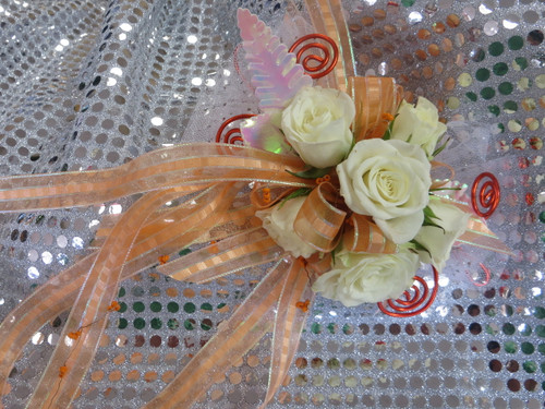 Orange Trimmed White Rose Corsage Prom Flower by Enchanted Florist Pasadena TX. Prom flowers in Pasadena TX for local high schools. Custom prom flowers Pasadena TX. PROM108