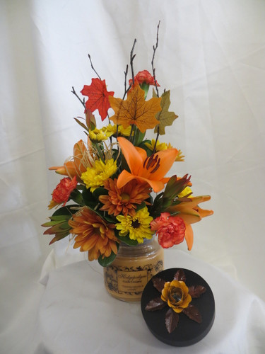 Fall Delight Flower Bouquet and Candle by Enchanted Florist Pasadena TX. Beautiful fall flowers with a candle make the perfect gift for friends and family this season. RM204