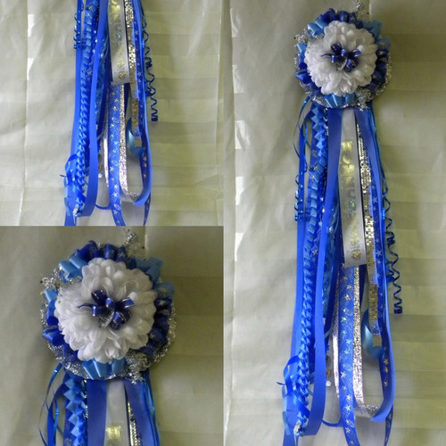 The Sam Rayburn High School Homecoming Mum with Braid from Enchanted Florist can be designed in any color for any school. It includes a single mum flower, trinkets, a chain, and a Military braid as shown. Plus all our mums come with a bell and 2 names. HMC126