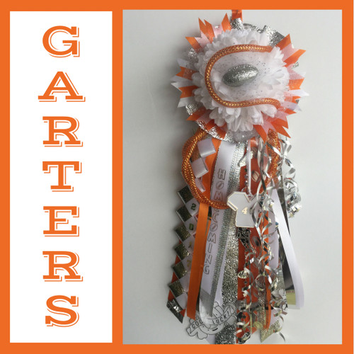 The La Porte High School Homecoming Garter from Enchanted Florist includes a single garter flower, trinkets, metallic chain, the Diamond braid and garter band in the school colors of your choice.  HMC144