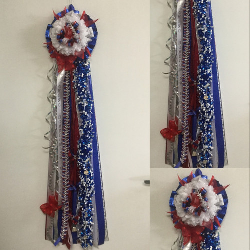 The Clear Lake High School Homecoming Mum from Enchanted Florist can be designed in any color for any school. It includes a single mum flower, trinkets, a chain, and a braid as shown. Two names are also included in the price. HCM155