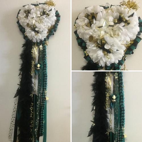 Heart Shaped Homecoming Mum by Enchanted Florist, your homecoming mums headquarters.
This mum will come with 1 boa, 1 metallic chain, and 1 military braid. Trinkets on this mum will vary according to availibility. HMC102