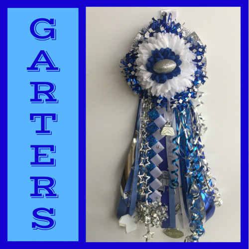 The Sam Rayburn High School Homecoming Garter from Enchanted Florist includes a single garter flower, trinkets, metallic chain, the Diamond braid and garter band in the school colors of your choice.  HMC145