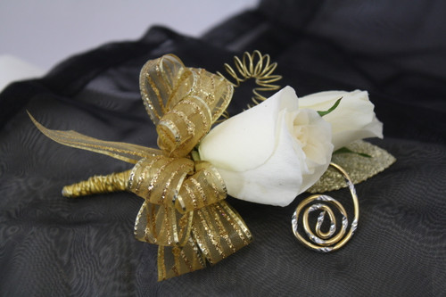 The Hemsworth Prom Boutonniere Gold Ribbons with Spray Roses by Enchanted Florist Pasadena TX. The Hemsworth utilizes all gold ribbons and wire with 2 spray roses for a more contemporary look for prom.  PROM111