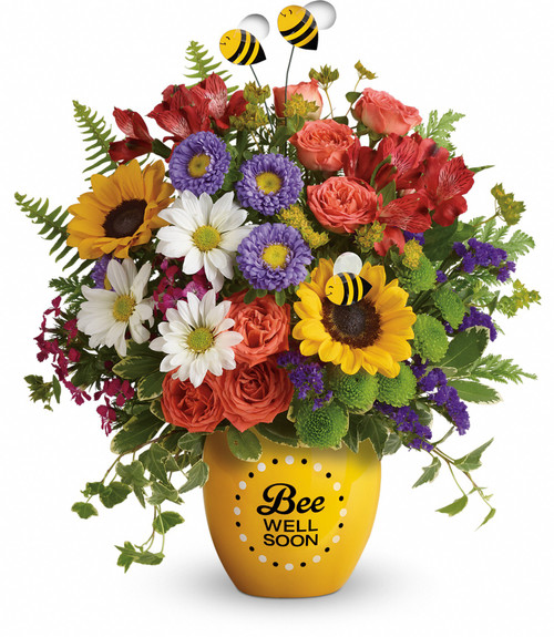 Buzzing Bee Well Soon Pot of Flowers from Enchanted Florist. Our get well bouquet of flowers includes orange spray roses, red alstroemeria, yellow sunflowers, green button mums, white daisies, purple statice, various filler flowers and accented with greenery. Same day delivery and arranged in a Buzzing Bee Well pot. SKU RM174