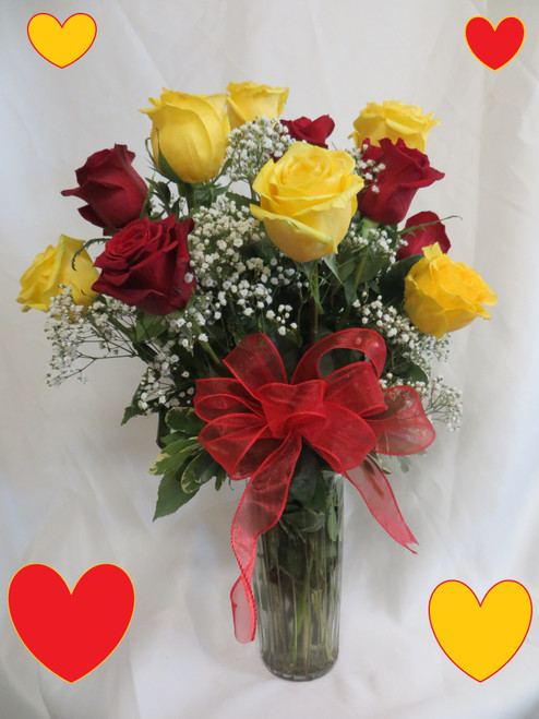 Yellow and Red Dozen Roses for Valentines Day by Enchanted Florist  - One dozen long stems yellow and red roses are arranged in a vase with baby's breath and ribbons as pictured. Don't make you special someone design her own flowers from a box! Our beautiful Ecuadorean roses are hand designed by expert floral artisans here in our Pasadena flower shops. Red is the color of love and yellow is the color for friendship because she is your best friend too!
Approximately 18"W x 22"H  
SKU RM960