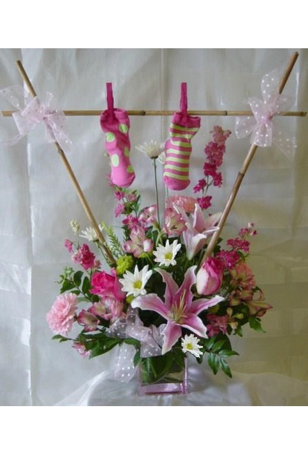 baby girl with flowers