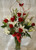 Butterfly Memories White Lilies and Red Roses by Enchanted Florist Pasadena TX. Red roses and white lilies in a clear vase with curly willow and red butterfly. Same day flowers in Houston TX.  RM513