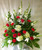 Sweet Devotions Red and White Funeral Flowers by Enchanted Florist Pasadena TX. Send a sweet sympathy flower arrangement of traditional red carnations, classic red roses, white gladiolas, white snapdragons, and white hydrangeas in a white funeral container. 
Approximately 34"H x 26"W (size does not include easel) 
SKU RM520
