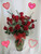 Red Two Dozen Roses for Valentines Day with baby's breath by Enchanted Florist Pasadena TX. This show stopping bouquets of our lush and romantic red roses comes complete with baby's breath, greens and a bow and is hand arranged by our premier floral designers. RM908