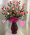 Pink Two Dozen Roses with Baby's Breath for Valentines Day by Enchanted Florist Pasadena TX. Our Malibu roses are a top selling pink rose that are a creamy white with pink tips, a bi-color rose is always a show stopper.

Pictured is the STANDARD OPTION with 24 pink roses.  The DELUXE OPTION will have 27 roses. The PREMIUM OPTION will have 30 roses. 
Size is approximately 26"H x 16"W  
SKU RM954