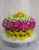 Happy Birthday Cake in Yellow from Enchanted Florist - This beautiful birthday cake of yellow flowers will light up any birthday girl's face, with out adding any pounds! Includes yellow daisies, hydrangeas, baby's breath, pixie carnations, and a rose on a cake stand. Yes! Cake stand and candles are included. Approximately 11"W x 8"H. For local delivery only.
SKU RM135