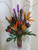 Eden Always Bird of Paradise Bouquet from Enchanted Florist Pasadena TX. This tropical bouquet includes birds of paradise, purple liatris, protea, safari sunset and is accented with the perfect greenery touches. Approximately 26"H x 16"W  For local delivery only.
SKU RM114