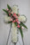 Pink Rose and Stargazer Cross of Sympathy Flowers from Enchanted Florist. Stunning funeral flowers such as pink roses, pink spray roses, and pink stargazer lilies are arranged on this floral cross that is covered in white mum flowers is full of love and devotion, arriving on a wire funeral easel. Approximately 22" W x 34" H (Dimensions do not include easel)
SKU RM552