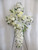 Angelic All White Funeral Cross of Flowers from Enchanted Florist. Stunning funeral flowers such as white roses, carnations, and lilies are arranged on this floral cross that is covered in white mums and button flowers is full of love and devotion, arriving on a wire funeral easel. Approximately 26" W x 36" H (Dimensions do not include easel)
SKU RM579