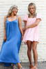 The Mallory Maxi Dress in Dark Sky Blue & Kaylee is wearing one of our Baby Doll Free people Mini Dresses