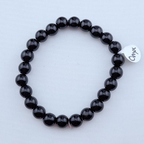 A single Black Onyx stretch bracelet with polished 8mm black beads on a white background.