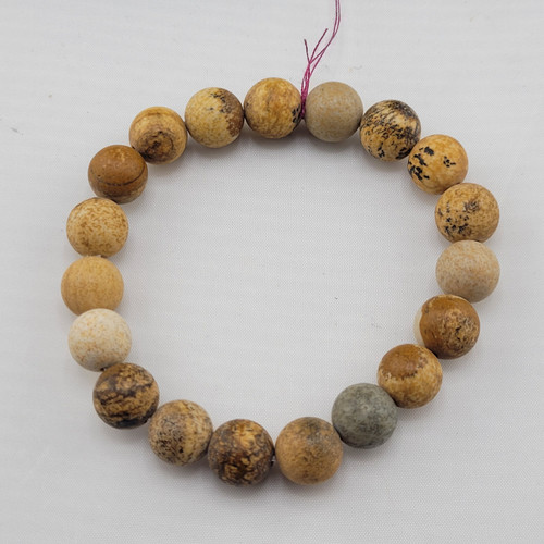 A single Picture Jasper stretch bracelet featuring 8mm polished beads with natural tan and brown landscape patterns.