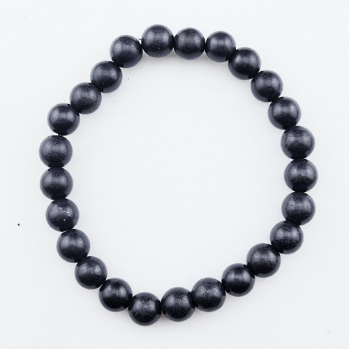 A single Shungite stretch bracelet featuring 8mm polished charcoal-black beads on a white background.