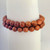 Close-up of goldstone 8mm gemstone bead bracelet showing sparkle detail
