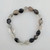 Rutilated quartz 8mm bead bracelet flat lay showing natural internal rutile inclusions