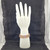 Amethyst and citrine gemstone bead bracelet displayed on white hand stand