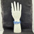 Blue Kyanite chip bracelet resting on a textured black surface.
