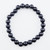 A single Shungite stretch bracelet featuring 8mm polished charcoal-black beads on a white background.
