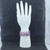 A stack of Super 7 bracelets displayed on a white mannequin hand to show the unique patterns of each bead.