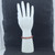 A stack of Red Agate bracelets on a white mannequin hand display against a dark background.
