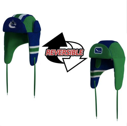 Hockey Sockey Vancouver Canucks NHL Reversible Trapper, two-tone green and blue hockey trapper hats with team logos, reversible design with arrow indicating switch between sides. Hockey Sockey Vancouver Canucks NHL Reversible Trapper, two-tone green and blue hockey trapper hats with team logos, reversible design with arrow indicating switch between sides.