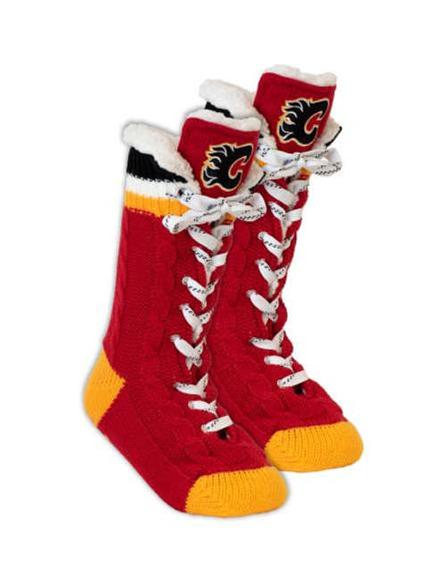 Hockey Sockey Calgary Flames NHL Slipper Skates, red and yellow sock-style slippers designed to look like hockey skates with Calgary Flames logo. Hockey Sockey Calgary Flames NHL Slipper Skates, red and yellow sock-style slippers designed to look like hockey skates with Calgary Flames logo.