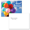 Birthday postcard with photo of person holding a bunch of bright balloons against a blue sky accompanied by the words Happy Birthday in white.  Flip side text has the words "Wishing you every happiness today and always!".  12 of this birthday postcard style per box 