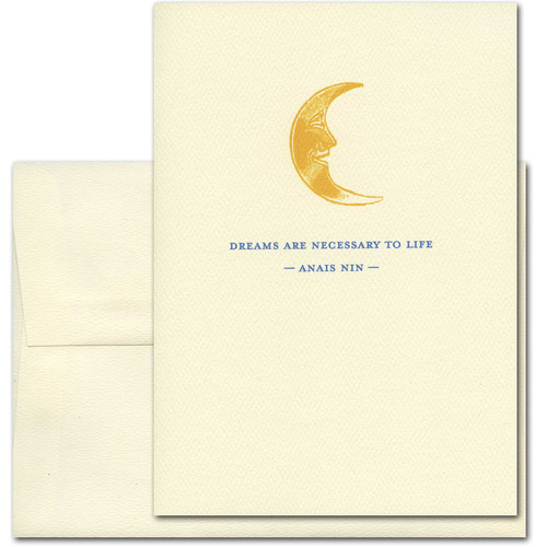 Quotation Card Dreams: Nin Cover shows old fashioned illustration of a happy faced gold crescent moon with a quote from Anais Nin reading: Dreams are necessary to life.