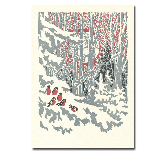 Evensong letterpress holiday card cover shows a flock of small birds feeding on the snowy ground in the forest