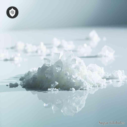 Ammonium Aceticum sugar spheres in orb format for energetic homeopathic (nonmedical) remedy presentation and dry storage