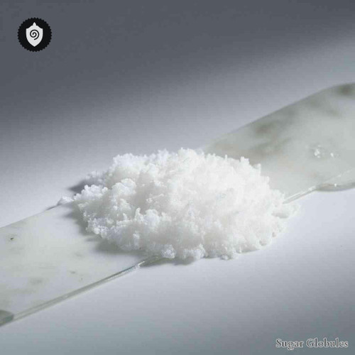 Ammonium Bromatum sugar spheres in uniform orb format for energetic homeopathic (nonmedical) dry-form presentation and storage