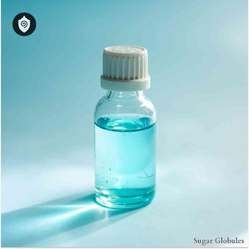 Cadmium Aceticum sugar spheres in compact orb presentation for energetic homeopathic (nonmedical) dry-form remedy packaging