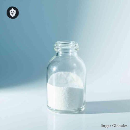 Clofibratum sugar orbs in standard spherical format for energetic homeopathic (nonmedical) remedy presentation and dry storage