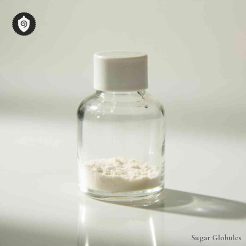 Europium Carbonicum sugar granules in uniform orb format for energetic homeopathic (nonmedical) physical product presentation