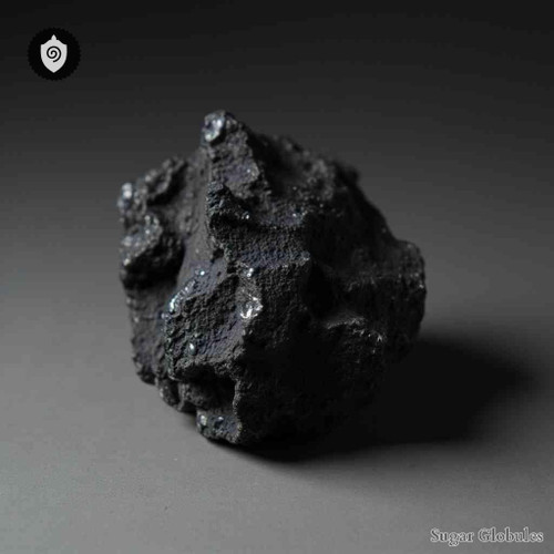 Fuligo Ligni sugar spheres in uniform pellet form for energetic homeopathic (nonmedical) dry-form product presentation