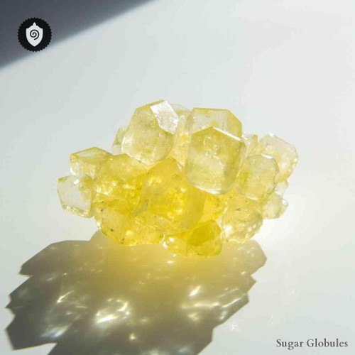 Gadolinium Oxalicum sugar spheres in precise orb form for energetic homeopathic (nonmedical) dry presentation and storage