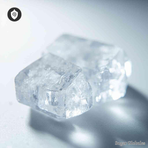 Guainidinum Muriaticum sugar spheres in compact orb form for energetic homeopathic (nonmedical) dry-form presentation and storage