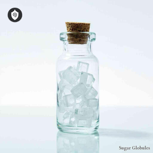 Natrium Succinatum sugar spheres in orb form for energetic homeopathic (nonmedical) remedy with precise dry-form presentation