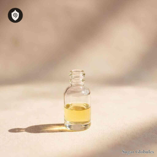 Oleum Taraktogenou Kurzii sugar spheres in compact orb form for energetic homeopathic (nonmedical) solid-form product presentation