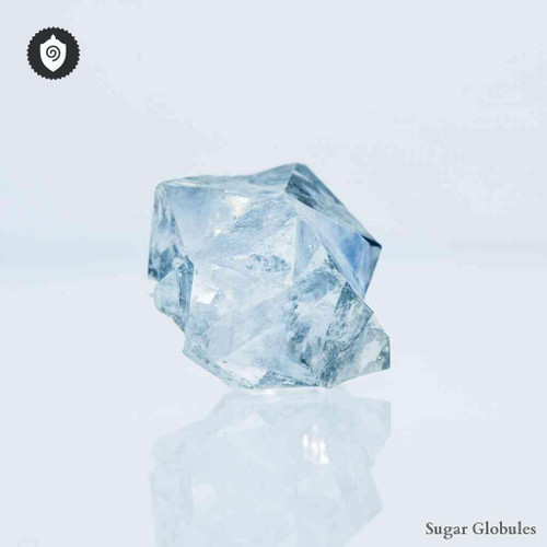 Scandium Fluoratum sugar spheres in uniform orb format for energetic homeopathic (nonmedical) dry-form presentation and storage