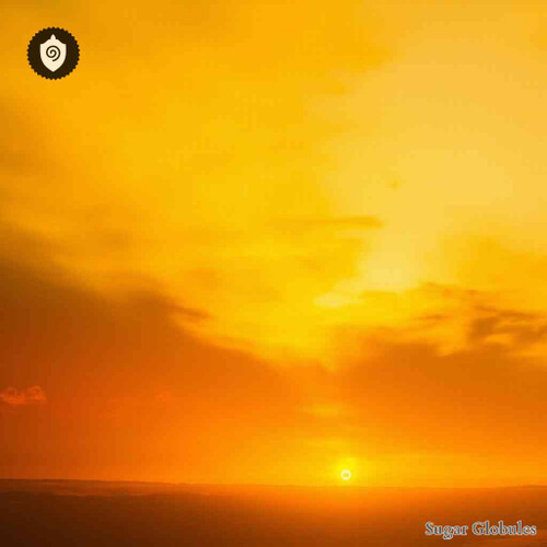 Sunset Yellow sugar spheres in uniform orb format for energetic homeopathic (nonmedical) physical product presentation