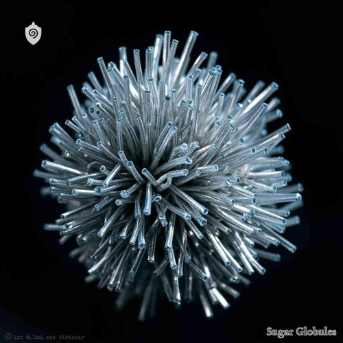 Tellurium sugar spheres in uniform granule form for energetic homeopathic (nonmedical) dry-form presentation and optimal storage