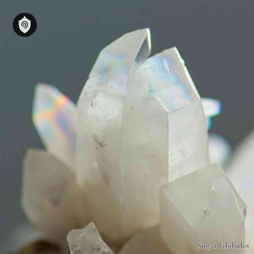 Dog Tooth Spar sugar spheres in precise orb form for energetic homeopathic (nonmedical) dry-form presentation and storage purposes