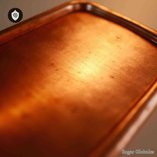 Copper sugar orbs in uniform spherical form for energetic homeopathic (nonmedical) dry-form presentation and easy storage